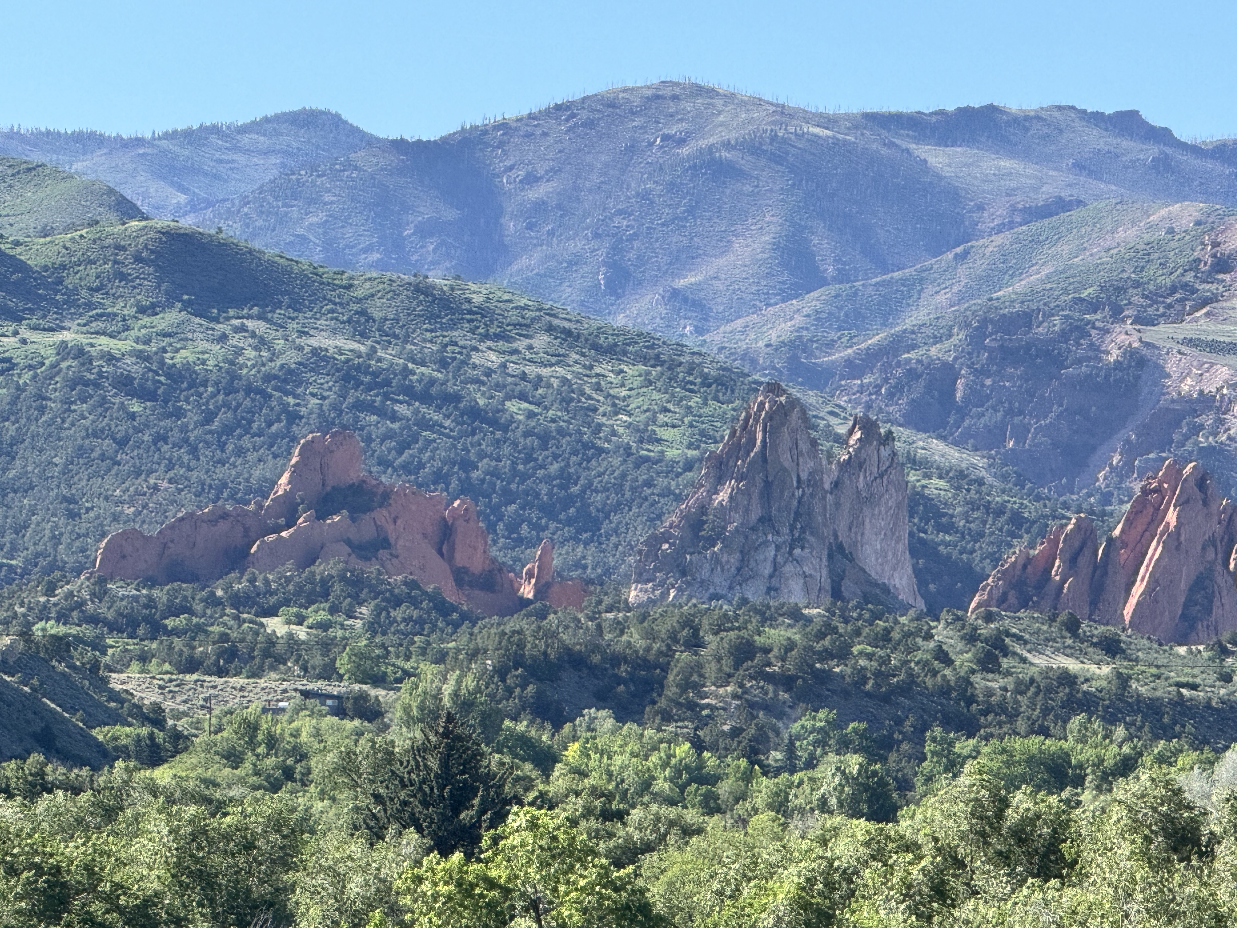 Peaceful mountain landscape at sunrise, reflecting on growth, clarity, and appreciating the life unfolding right now.
